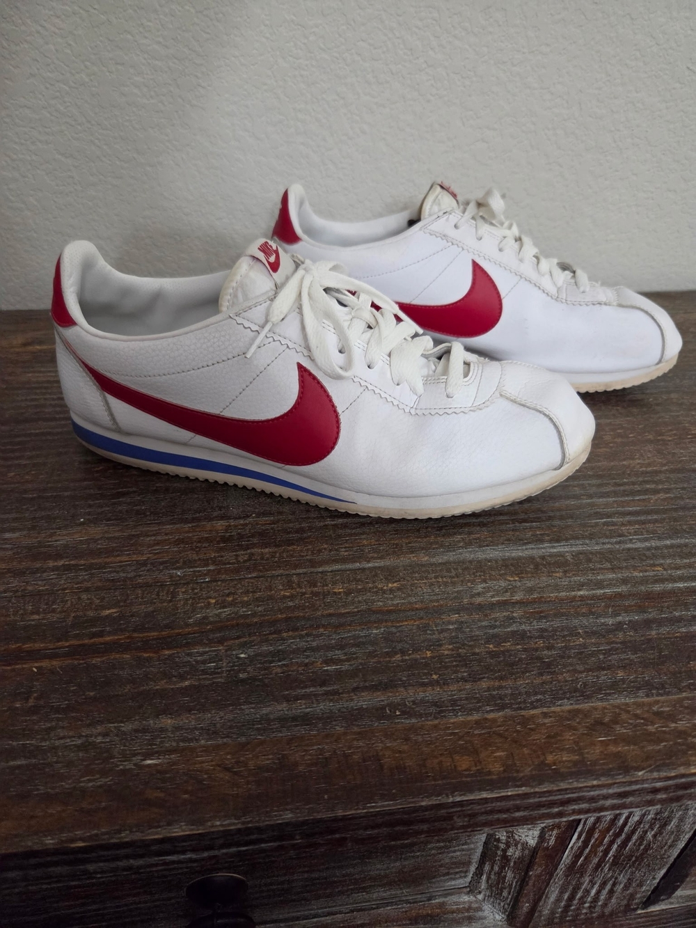 Nike Men's White Sneakers with Red Swoosh